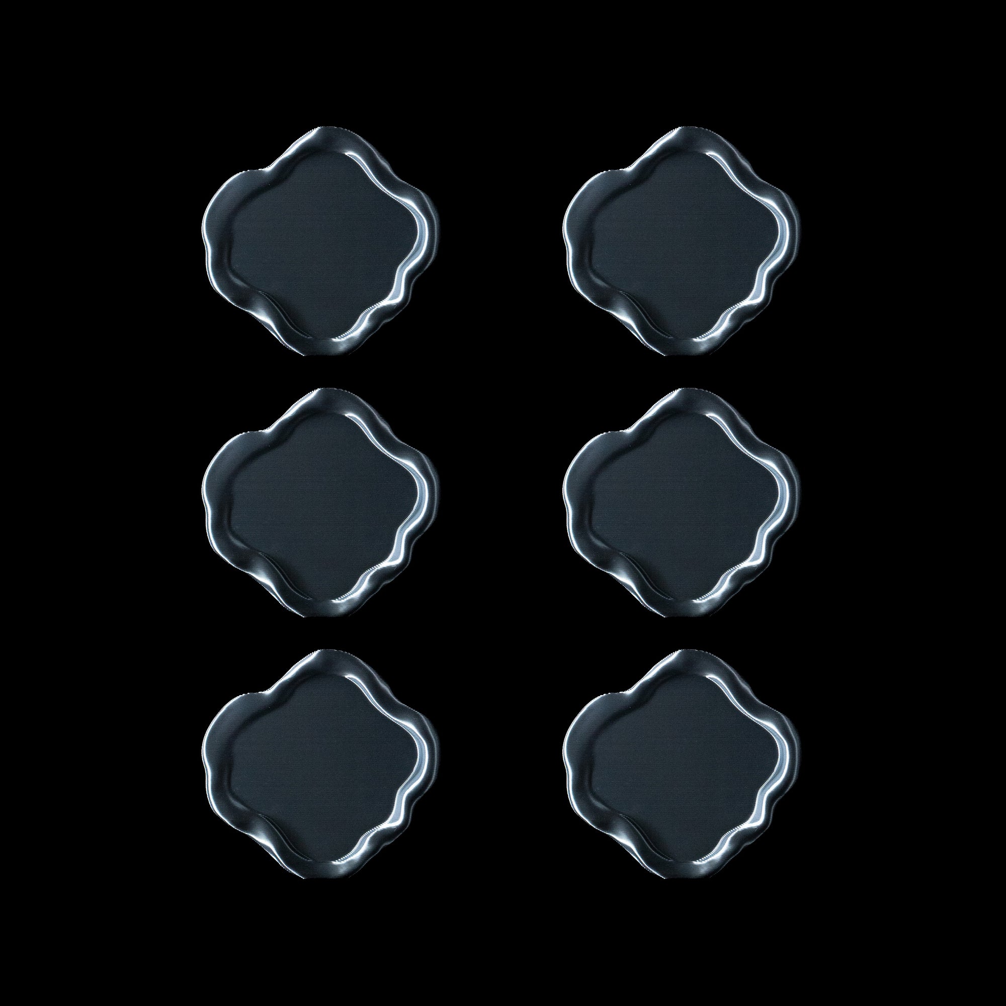 Lot de six dessous de verre Fuso en coloris Aether, disposés en deux colonnes sur fond noir